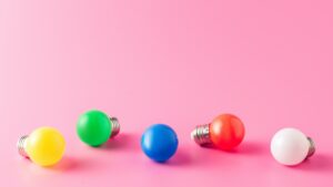 close-up view of bright colorful light bulbs on pink